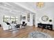 Spacious living room with hardwood floors, fireplace, and built-in shelving at 3904 Delinger Dr, Mount Pleasant, SC 29466
