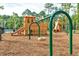 Wooden playground structure with swings and slides at 3904 Delinger Dr, Mount Pleasant, SC 29466