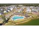 Aerial view of community pool and lakefront homes at 3904 Delinger Dr, Mount Pleasant, SC 29466