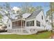 Two-story home with screened porch, deck, and landscaped yard at 3904 Delinger Dr, Mount Pleasant, SC 29466