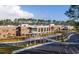 Aerial view of a large brick school building with ample parking and landscaping at 3904 Delinger Dr, Mount Pleasant, SC 29466