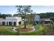 Aerial view of a modern building with a unique architectural design and landscaped grounds at 3904 Delinger Dr, Mount Pleasant, SC 29466
