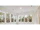 Bright sunroom featuring abundant windows and hardwood floors at 3904 Delinger Dr, Mount Pleasant, SC 29466