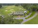 Aerial view of golf course clubhouse and surrounding landscape at 161 Golfview Ln, Summerville, SC 29485