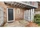 Private patio with brick wall and white picket fence at 21 Rivers Point Row # 4B, Charleston, SC 29412