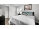 Bright bedroom with a queen-size bed and wood-look floors at 21 Rivers Point Row # 4B, Charleston, SC 29412