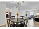 Small dining area with a round table and chairs at 21 Rivers Point Row # 4B, Charleston, SC 29412