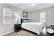 Bedroom with queen bed, nightstand, and wood-look floors at 21 Rivers Point Row # 4B, Charleston, SC 29412