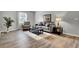 Living room with sofa, armchair, and coffee table at 21 Rivers Point Row # 4B, Charleston, SC 29412