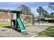 playground with climbing structure, slide, and swings at 21 Rivers Point Row # 4B, Charleston, SC 29412