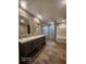 Modern bathroom with double vanity, tile, and a bathtub at 317 Marion Rd, Dorchester, SC 29437