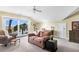 Bright sitting room with water views and comfortable seating at 169 Marsh Island Dr, Kiawah Island, SC 29455
