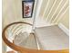 View from above of a modern spiral staircase with wood and carpet at 169 Marsh Island Dr, Kiawah Island, SC 29455