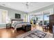 Main bedroom with access to sunroom at 169 Marsh Island Dr, Kiawah Island, SC 29455