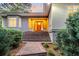 Brick pathway leads to home's inviting entryway at 169 Marsh Island Dr, Kiawah Island, SC 29455