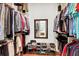Large walk-in closet with ample hanging space and shoe storage at 169 Marsh Island Dr, Kiawah Island, SC 29455