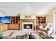 Sitting room boasts a fireplace, built-in shelves, and calming water views at 169 Marsh Island Dr, Kiawah Island, SC 29455