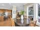 Round dining table with kitchen views at 169 Marsh Island Dr, Kiawah Island, SC 29455