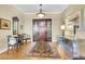 Bright entryway with hardwood floors and open concept at 169 Marsh Island Dr, Kiawah Island, SC 29455