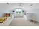 Charming bedroom with twin beds, built-in drawers, and calming decor at 169 Marsh Island Dr, Kiawah Island, SC 29455