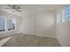 Spacious bedroom with hardwood floors and large windows at 309 Trailmore Ln, Summerville, SC 29486