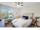 Cozy bedroom with a queen bed, window seating, and a large window at 45 Sycamore Ave # 637, Charleston, SC 29407