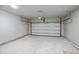 Unfinished garage with light grey walls and a large garage door at 164 Aleene Drive Dr, Summerville, SC 29485