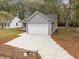 Aerial view of a gray house with a driveway at 164 Aleene Drive Dr, Summerville, SC 29485