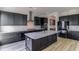 Modern kitchen with dark cabinetry and quartz island at 218 Symphony Ave, Summerville, SC 29486