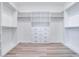 Large walk-in closet with ample shelving and hanging space at 218 Symphony Ave, Summerville, SC 29486