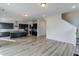 Open concept kitchen with island, stainless steel appliances, and dark cabinetry at 218 Symphony Ave, Summerville, SC 29486