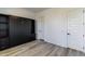 Bedroom with built-in wall unit and hardwood floors at 218 Symphony Ave, Summerville, SC 29486