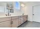 Modern bathroom with double vanity, hexagon floor tile, and a walk-in shower at 218 Symphony Ave, Summerville, SC 29486