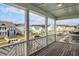 Covered porch overlooking a charming neighborhood at 218 Symphony Ave, Summerville, SC 29486