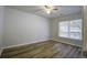 Bright bedroom featuring wood-look flooring and large window at 118 Malibu Rd, Summerville, SC 29483