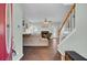 Spacious living room with hardwood floors, fireplace, and sectional sofa at 1600 Windsor Ln, Moncks Corner, SC 29461