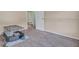 Small bedroom with carpet, closet, and access to bathroom at 1600 Windsor Ln, Moncks Corner, SC 29461