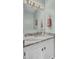 Bathroom with granite countertop, white cabinets and updated fixtures at 1600 Windsor Ln, Moncks Corner, SC 29461