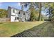 Spacious backyard with a large tree and wooden fence at 1600 Windsor Ln, Moncks Corner, SC 29461