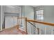 Upper-level laundry room with washer, dryer, and built-in cabinetry at 1600 Windsor Ln, Moncks Corner, SC 29461