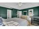 Bright bedroom with king-size bed and en-suite bathroom access at 1600 Windsor Ln, Moncks Corner, SC 29461