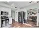 Modern kitchen with granite countertops and stainless steel appliances at 1600 Windsor Ln, Moncks Corner, SC 29461