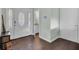 Hardwood floors, neutral walls, and access to half bath and living room at 1600 Windsor Ln, Moncks Corner, SC 29461