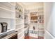Well-organized pantry with ample shelving for storage at 235 Cooper River Dr, Mount Pleasant, SC 29464