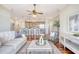 Open concept living room, kitchen, and breakfast bar with hardwood floors at 235 Cooper River Dr, Mount Pleasant, SC 29464