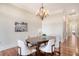 Bright dining room with hardwood floors and chandelier at 235 Cooper River Dr, Mount Pleasant, SC 29464