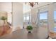 Modern dining room with oval table and neutral chairs at 235 Cooper River Dr, Mount Pleasant, SC 29464