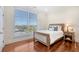 Bedroom with wood bed frame and hardwood floors at 235 Cooper River Dr, Mount Pleasant, SC 29464