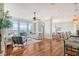 Spacious living area with hardwood floors, city views, and ample natural light at 235 Cooper River Dr, Mount Pleasant, SC 29464
