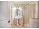 Elegant bathroom with pedestal sink, glass shower, and tile flooring at 235 Cooper River Dr, Mount Pleasant, SC 29464